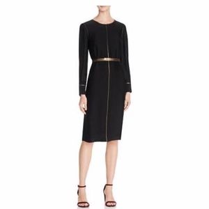 black dress with gold belt